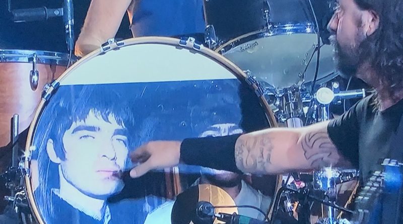 Foo Fighters decorate the drum kit with a 1995 photo of Noel and Liam